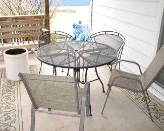 patio furniture and a cracked crock