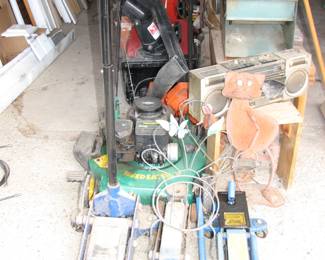not a great pic. squirrel cage fan, floor jacks, lawn mower snow blower yard art and more