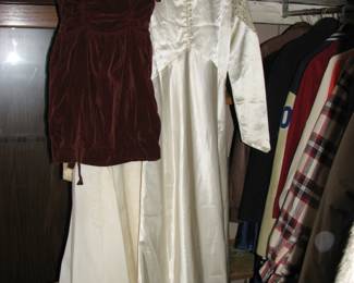 a couple wedding dresses and a vintage childs dress