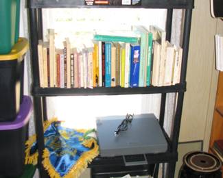 books, beer case, totes, churn and the other 2 typewriters