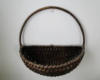 Antique half melon woven basket