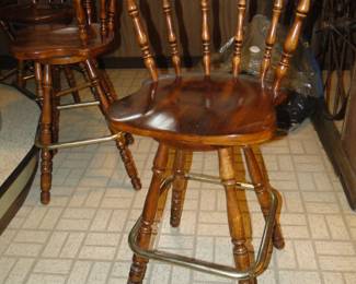 Set of 8 solid wood bar stools that actually pivot