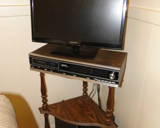 Nice smaller corner stand.  As you can see, holds a lot of electronics.