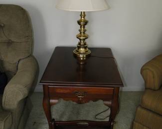 Very nice side table, and solid wood magazine or newspaper rack.  Brass lamp with shade