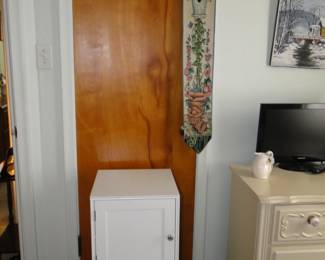 White cabinet with door
