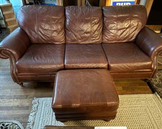 Nice and comfortable leather couch with ottoman