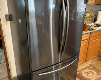 Almost new stainless steel refrigerator. (We will take contact information for interested parties and contact when the deal is finalized on the home)