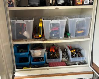 Screwdrivers, pliers, power tools, metal cabinets
