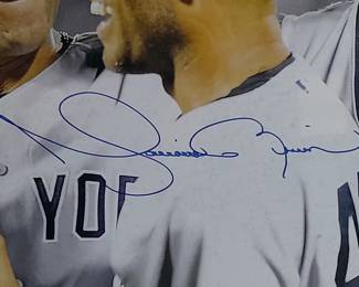 Photograph Of NY Yankees Derek Jeter #2 & Mariano Rivera #42 Autographed By Derek Jeter & Mariano Rivera. (Certified By Steiner Sports With Holographic Sticker). Measures 26x21.
