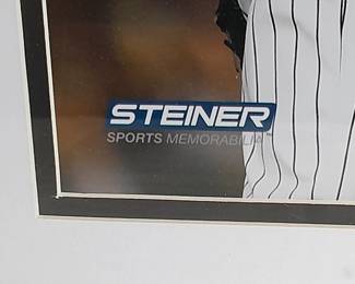 Photograph Of NY Yankees Mariano Rivera #42 Autographed By Mariano Rivera With "Exit Sandman" Inscription. (Certified By Steiner Sports With Identification Card). Measures 13x16.