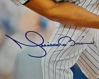 Photograph Of NY Yankees Mariano Rivera #42 "All Time Leader 602 Saves" Autographed By Mariano Rivera. (Certified By Steiner Sports With Identification Card). Measures 14x16.