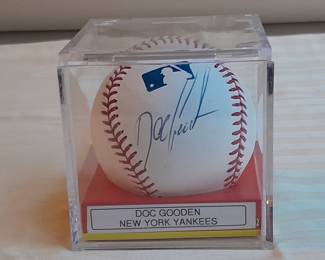 Baseball In Display Case Autographed By Doc Gooden - NY Yankees. (Uncertified).
