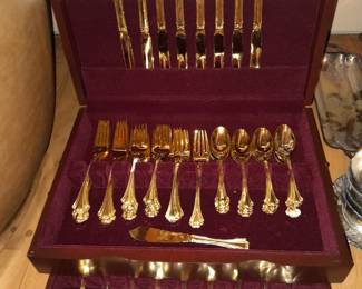 Gold Toned Flatware Set In Wooden Storage Box