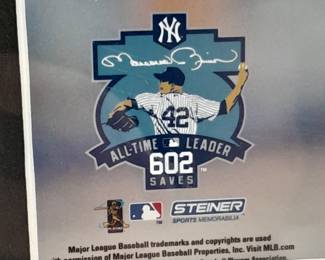 Photograph Of NY Yankees Mariano Rivera #42 "All Time Leader 602 Saves" Autographed By Mariano Rivera. (Certified By Steiner Sports With Identification Card). Measures 14x16.