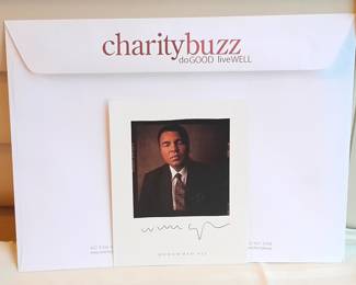 Photograph Postcard Of Mohammad Ali Autographed By Mohammad Ali (Certified By CharityBuzz). Measurements Unspecified.