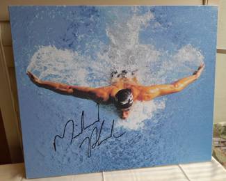Michael Phelps Photo On Stretched Canvas Autographed By Michael Phelps. (Certified By Sports Integrity). Measures 20x24.