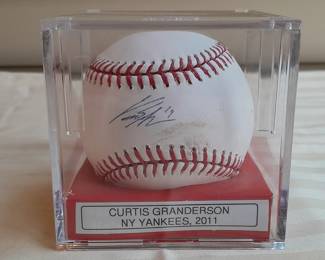 Baseball In Display Case Autographed By Curtis Granderson - NY Yankees 2011. (Certified By Steiner Sports With Holographic Sticker). 