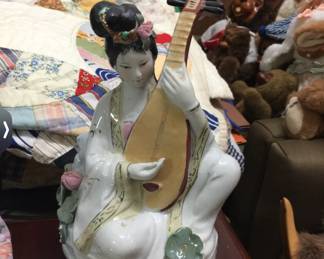 Vintage Asian porcelain figurine