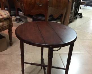 Round tables fold down & stores under square table