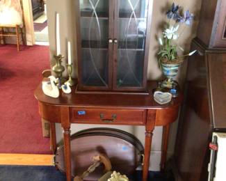 Table, curio cabinet, foot stool, wooden serving trays 