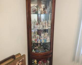 Lighted corner curio cabinet