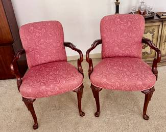 Pink patterned upholstered comfy chairs