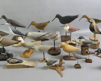 Many shore bird carvings