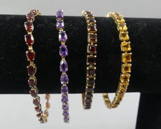 4 gold and gem bracelets