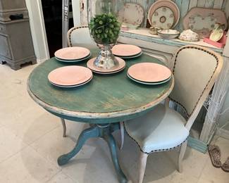 turn of the century French round table with light mint green custom leather chairs (2)