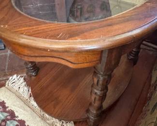We have a pair of these glass top oak end tables. 