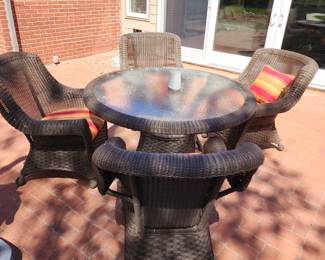 Wicker patio set, table and 4 chairs with plush cushions