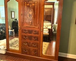  Early 1900s flame mahogany marquetry inlaid Federal style armoire with two mirrored doors