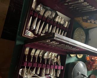 Silver plated utensil sets. $25 each set. 