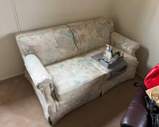 Small casual couch. Like new. The Pope  may or may not have once sat on it. 