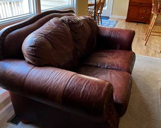 Leather Sofa, Loveseat, Chair and Ottoman. All quality leather, nailhead trim, wood bun legs
