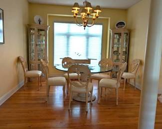 Elegant Dining Room: Glass Table, Chairs, Buffet on casters and 2 glass shelved with lighting China curios. Lenox China, Crystal and more