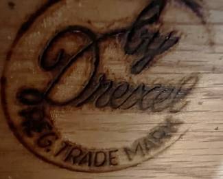 The Drexel maker's mark for the lighted china cabinet.