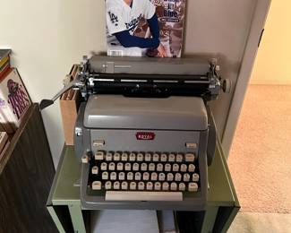 This is a vintage Royal typewriter and typewriter stand.