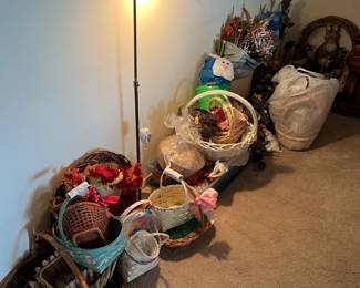 One wall has lots and lots of baskets.  And a lamp.
