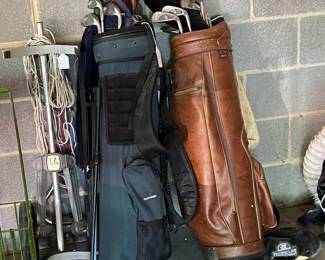 golf bags and clubs