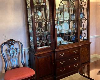 Lighted china cabinet with mirror back