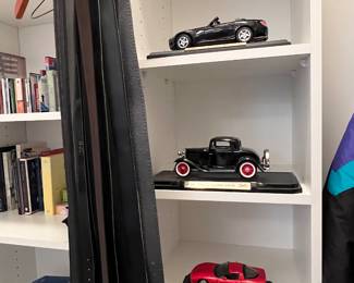 BELTS AND MODEL CARS