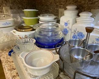 Large assortment of bowls, casserole dishes, serving pieces