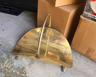 Brass fire wood log holder.  Footed.  Great vintage condition. Brass is having it's moment. 