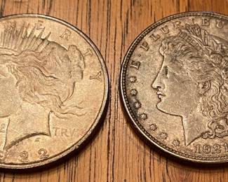 Assorted Peace Dollars and Morgan Dollar