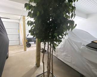 8' tall artificial tree with stand.