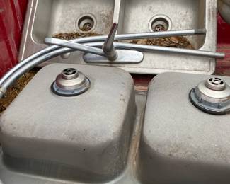 (2) double stainless kitchen sinks.