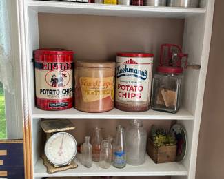 old tin boxes, old scale, old canister set and recipe boxes, old milk bottles, old coffee grinder,
