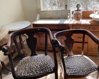 His and hers vintage courting chairs