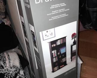 BRAND NEW DrawBridge Adjustable DVD Shelves (Holds 240 DVD Per Rack. 2 Racks Available.)